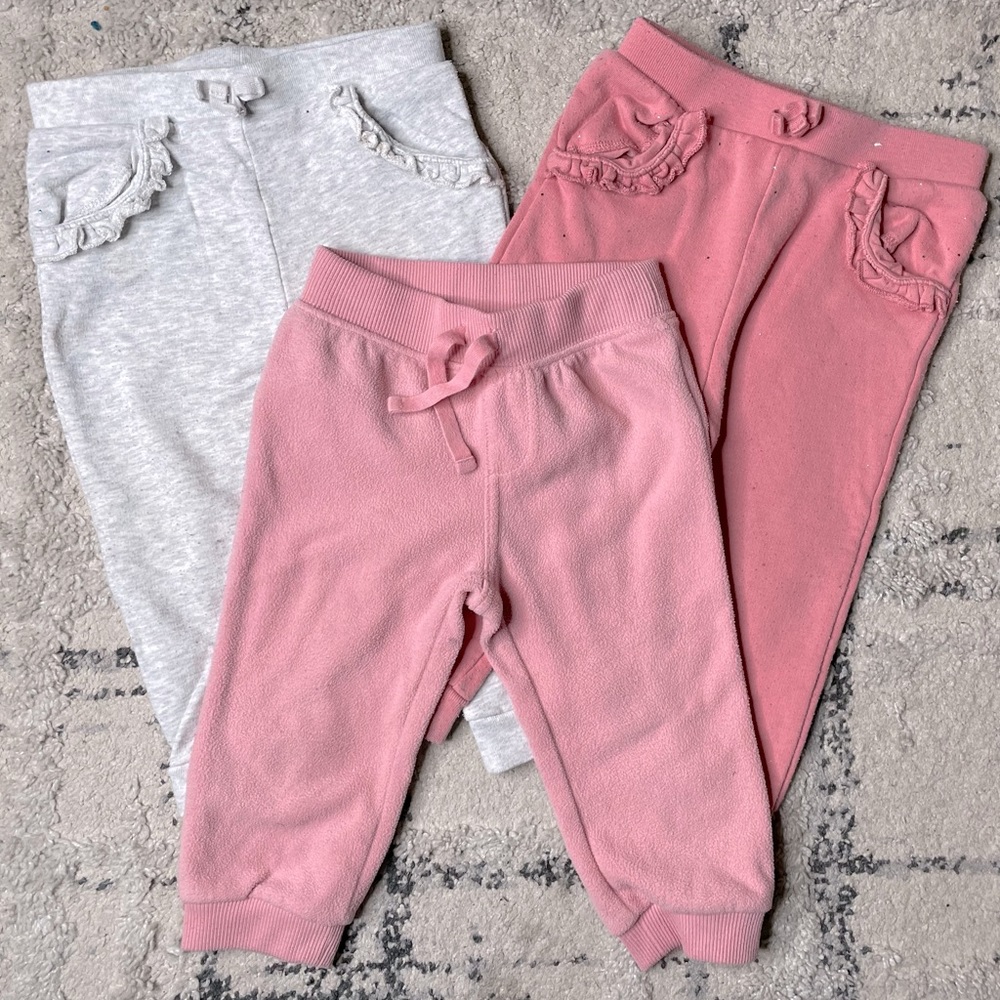 3 Pairs of Toddler Girl Sweatpants. 2 Pink and 1 Heathered Grey.